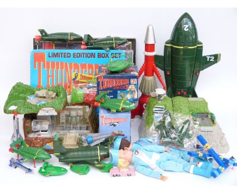 Eleven Thunderbirds models and games including puppets, Tracy Island, Talking Alarm Clock, Limited Edition Box Set etc, some 