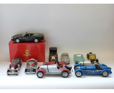 Twelve Franklin Mint, Burago and similar large scale diecast model vehicles, some in original boxes 