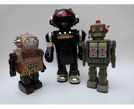 Three vintage battery operated robots including CODE 2003 AT-Z-X, 37cm tall