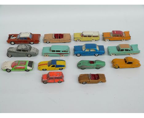 Fourteen Dinky Toys diecast model cars including Connaught 236, Jaguar 157, Plymouth Plaza taxi etc 