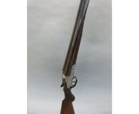 R Blanton of Ringwood 12 bore side by side sidelock shotgun with engraved locks, trigger guard, top plate and top lever, horn