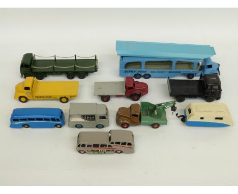 Ten Dinky Toys and Dinky Supertoys diecast model vehicles including Foden flat-bed, Leyland Comet, Berliet, Carrimore car tra