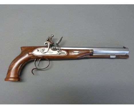 Pedersoli HW Mortimer & Son type .44 flintlock hammer action pistol with named lock, shaped grip, spurred trigger guard, horn