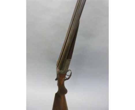 Halloway & Co 12 bore side by side shotgun with named and engraved locks, chequered semi-pistol grip, double trigger, vacant 