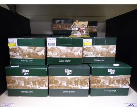 Twenty-six dark green boxed Lilliput Lane cottages to include Snow Stories, The Mill & Engine House and Bottle of Cheer, with