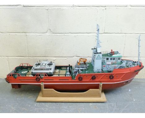 A large remote controlled model boat on stand, in fitted wooden box, length 112cm
