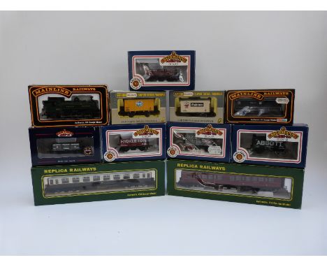 Eleven Mainline, Bachmann, Wrenn and Replica Railways 00 gauge locomotives and wagons, all in original boxes