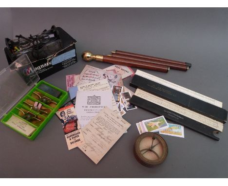 Three small modern woodworking planes, brass compass/sextant, slide rules, walking stick with compass knop 