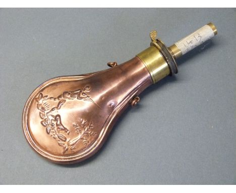G & J W Hawksley copper and brass powder flask with embossed scenes to both sides of a man shooting with his dog to both side