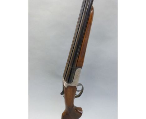 Zabala 12 bore side by side ejector shotgun with ornately engraved locks, top lever and top plate, chequered semi-pistol grip