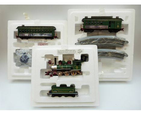 A Bachmann 0 gauge train set Thomas Kinkade's Christmas Express, in original boxes with certificates of authenticity