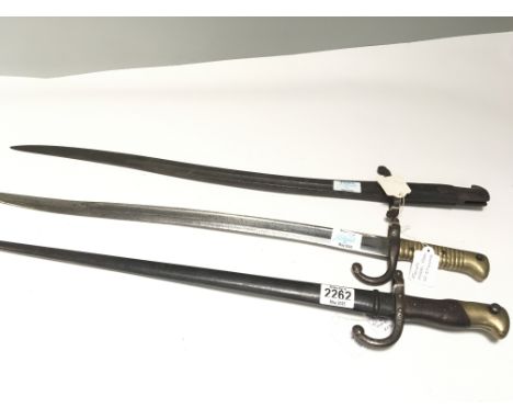 A British 1856 pattern Yataghan bayonet numbered 107 with further small stamp marks on the blade no scabbard a French 1866 pa