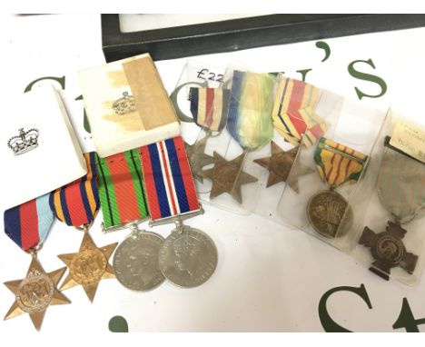 A collection of Medals including An American Vietnam service medal French Croix de Combattant. British II world war medals in