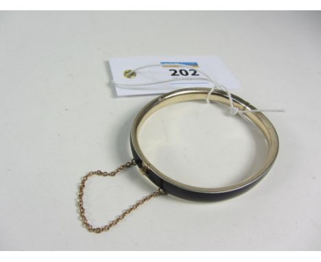 Black enamelled hinged bangle stamped 9ct