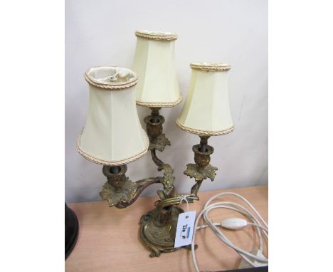 Rococo design gilt brass three branch table lamp