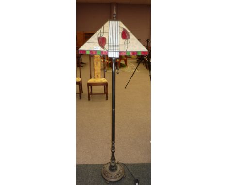 Three bulb standard lamp with Tiffany style shade 