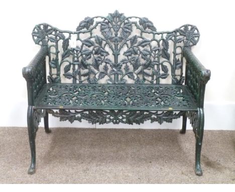 Heavy cast iron painted ornate garden bench with rams head arms, W111cm