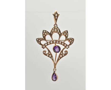 AN EARLY 20TH CENTURY LAVALIER PENDANT/BROOCH, an open work pendant set with a principle circular cut amethyst, seed pearls a