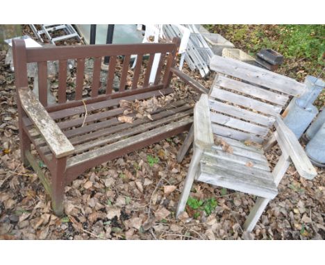 A WOODEN SLATTED GARDEN BENCH width 128cm and a wooden slatted garden chair (2)