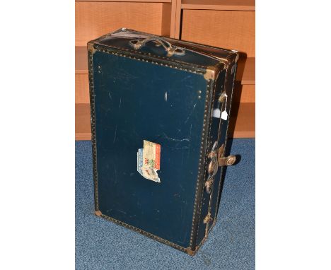 A VINTAGE 'WATAJOY' DARK BLUE LEATHER MOUNTED CABIN TRUNK WITH CUNARD WHITE STAR TO EUROPE LABEL TO THE LID, partially over s