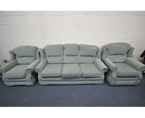 A GREEN UPHOLSTERED THREE PIECE LOUNGE SUITE, comprising a three seater sofa, length 190cm, an armchair, and a manual reclini