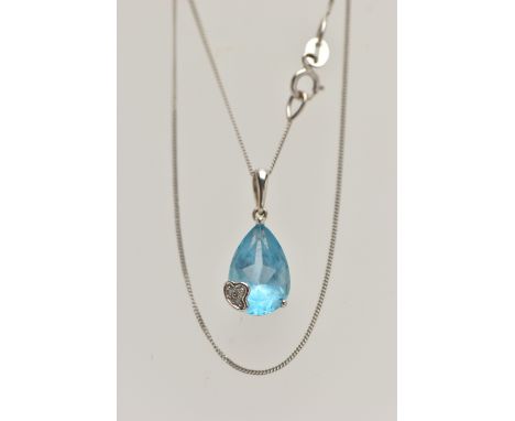 A WHITE METAL TOPAZ AND DIAMOND PENDANT NECKLACE, the pendant set with a pear cut light blue topaz, with single cut diamond a