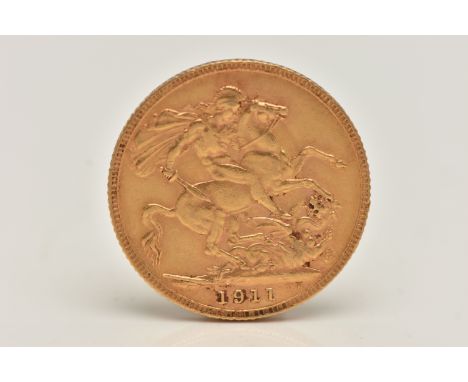 AN EARLY 20TH CENTURY FULL GOLD SOVEREIGN COIN, depicting George V, dated 1911, approximate gross weight 8.1 grams (condition