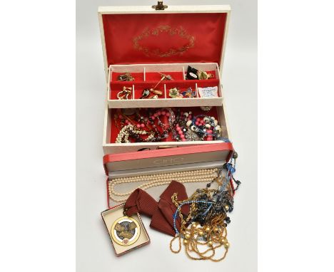 A JEWELLERY BOX WITH CONTENTS, cream jewellery box with contents to include beaded necklaces, costume earrings from Monet, So