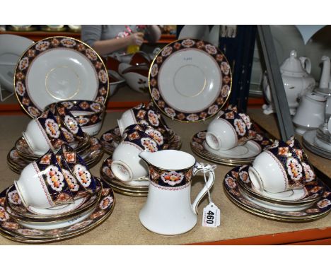 A ROYAL ALBERT 'HEIRLOOM' PATTERN PART TEA SET, comprising twelve cups, saucers and side plates, a milk jug, slops bowl and t