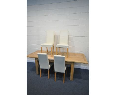 A SOLID LIGHT OAK EXTENDING DINING TABLE, with two additional leaves, open length 230cm x closed length 160cm x depth 90cm x 