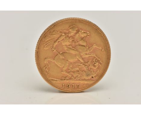 AN EARLY 20TH CENTURY FULL GOLD SOVEREIGN COIN, depicting Edward VII, dated 1910, approximate gross weight 8.1 grams (conditi