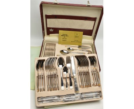 AN SBS 'SOLIGEN' BRIEFCASE CANTEEN, two tone pieces of cutlery, eight person table setting, with additional ladles, pie serve