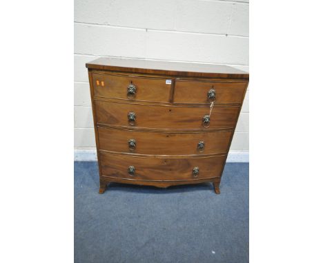 A GEORGIAN MAHOGANY CHEST OF TWO SHORT OVER THREE LONG DRAWERS, with later brass lion mask handles, on bracket feet, width 10