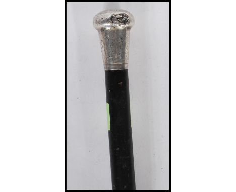 A 19th Century Victorian silver topped Opera walking stick having an ebonised shaft with a silver hallmarked top. Hallmarked 