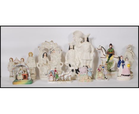 A 19th century Staffordshire flatback figurines entitled ‘ Fortune Teler, Robin Hood, Fred Archer together with further bisqu