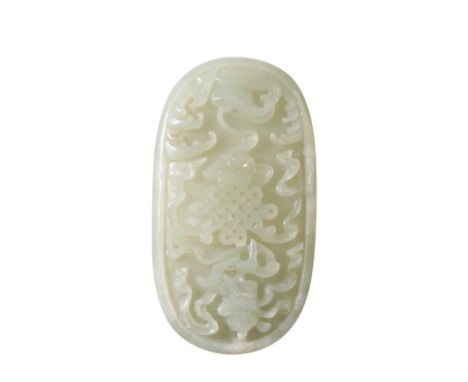 A CHINESE CARVED WHITE JADE PLAQUE, QING, carved with a continuous knot, 9cm long. 