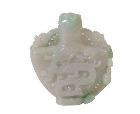 A CHINESE JADE SNUFF BOTTLE AND STOPPER of flattened baluster form, carved on one side with a phoenix and the other with a dr