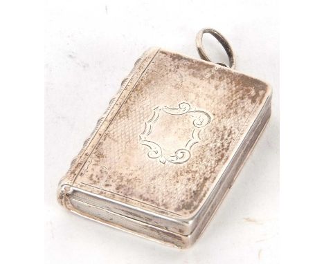 A Victorian silver vinaigarette, circa 1836 in a form of a bound book with engine turned decoration around a plain cartouche 
