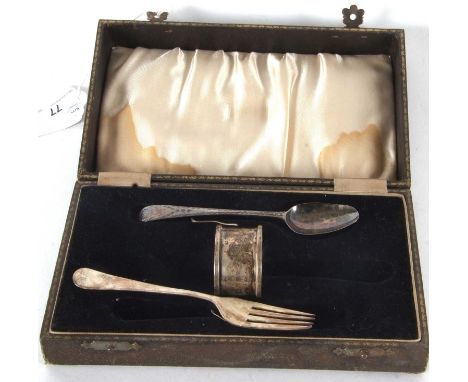 A cased Georgian Old English bright cut teaspoon, a George V fork, hallmarked for Sheffield 1937 together with a plain silver