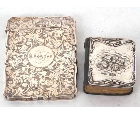 Mixed Lot: Late Victorian silver card case of shaped rectangular form, chased and engraved all over with a central round cart