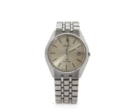 A Seiko Grand Seiko quartz wristwatch, reference number 9587-8000, it has a stainless steel case and bracelet, champagne dial