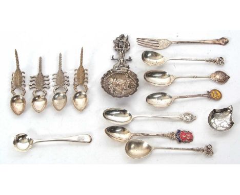 Mixed Lot: A Dutch white metal decorative caddy spoon, the round shaped bowl embossed with figure and boats, 12cm long, six v