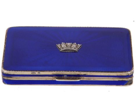 A George V silver and enamel box of rectangular form, the hinged lid and sides with a royal blue guilloche enamel detail, the