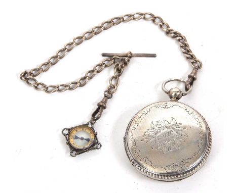 A Railway Timekeeper pocket watch with silver albert chain, the pocket watch has a key wound movement, a white enamel dial wi