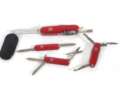 Group of four various Swiss Army penknives, two multi-tooled and two with twin blades, 5.5-9cm long