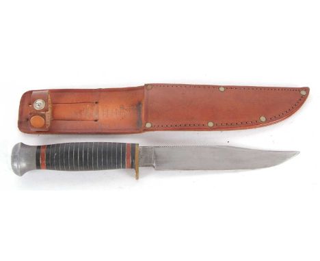 A George Wostenholm, Sheffield "Nimrod" hunting knife, leather grip and sheath, 22.5cm long