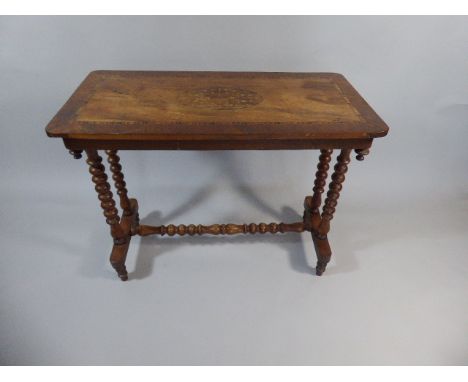 A Pretty Victorian Inlaid Walnut and Mahogany Table with Bobbin Supports and Stretcher 89x44x69cm
