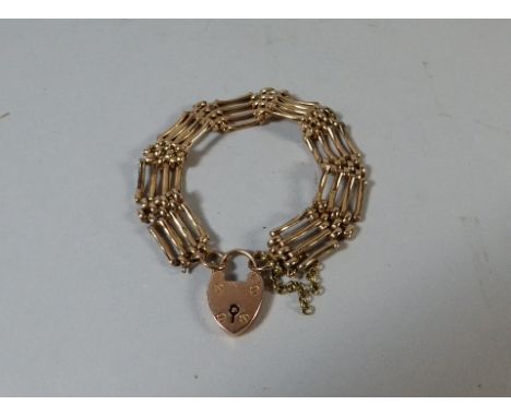 A Nine Carat Gold Gate Bracelet with Padlock Clasp, 17.7gms