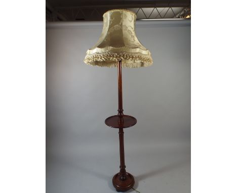 A Turned Mahogany Standard Lamp with Shade