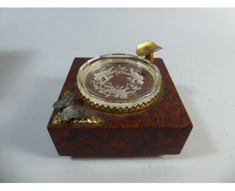 A Pretty French Tortoiseshell Ormolu and Etched Crystal Musical Automaton Ashtray. The Cigar Rest with Button which Activates